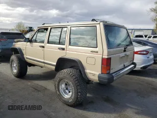 1989 Jeep Cherokee with VIN 1J4FJ38L2KL462983, listed as a Copart auction lot 48012545 with Not provided miles and Salvage title. Bid and sale history available at DreamBid. Image 2.