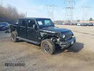 2021 Jeep Gladiator Overland z VIN 1C6HJTFG1ML606215, wystawiony jako IAAI lot #41771646 z przebiegiem 77 411 mil mil oraz . Historia ofert i sprzedaży dostępna na DreamBid. Obrazek 1.