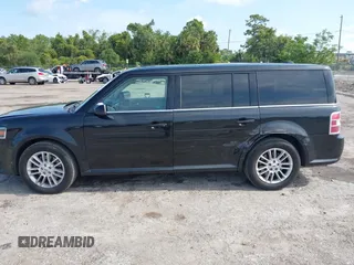 2014 Ford Flex SEL z VIN 2FMGK5C8XEBD13484, wystawiony jako IAAI lot #42235548 z przebiegiem 172 570 mil mil oraz . Historia ofert i sprzedaży dostępna na DreamBid. Obrazek 14.