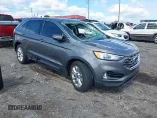 2021 Ford Edge Titanium z VIN 2FMPK3K9XMBA21766, wystawiony jako IAAI lot #42187940 z przebiegiem 79 732 mil mil oraz . Historia ofert i sprzedaży dostępna na DreamBid. Obrazek 1.