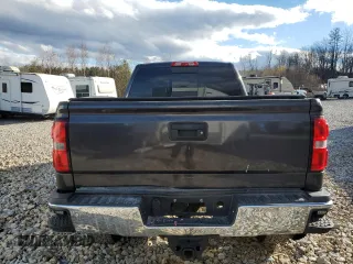 2015 GMC Sierra 2500HD SLT with VIN 1GT12ZEG1FF180216, listed as a Copart auction lot 77076384 with 67,751 mi miles and Salvage title. Bid and sale history available at DreamBid. Image 6.