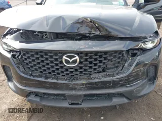 2024 Mazda CX-50 2.5 S Preferred Package with VIN 7MMVABBM0RN244794, listed as a IAAI auction lot 41848993 with 8,392 mi miles. Bid and sale history available at carsss.com. Image 6.