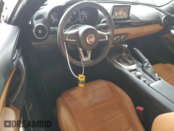 2017 FIAT 124 Spider Elaborazione Abarth z VIN JC1NFAEK3H0101935, wystawiony jako Copart lot #53767824 z przebiegiem 43 613 mil mil oraz Szkoda całkowita • Salvage title. Historia ofert i sprzedaży dostępna na DreamBid. Obrazek 8.