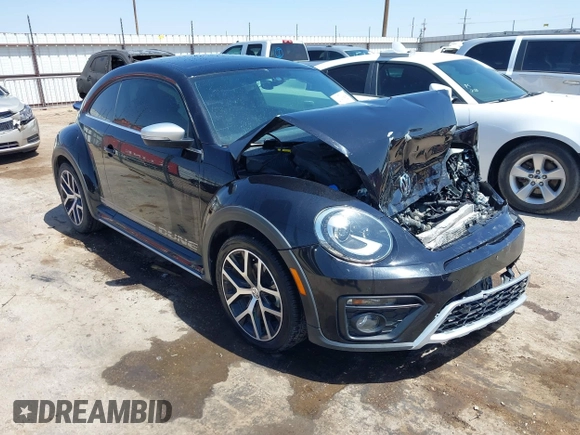 2018 Volkswagen Beetle Dune with VIN 3VWSD7AT1JM702354, listed as a IAAI auction lot 41993527 with 50,952 mi miles and . Bid and sale history available at DreamBid. Image 1.