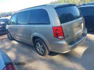2013 Dodge Grand Caravan SXT with VIN 2C4RDGCGXDR553019, listed as a IAAI auction lot 42053186 with 341,864 mi miles and . Bid and sale history available at DreamBid. Image 3.