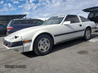 1985 Nissan 300ZX z VIN JN1HZ16S9FX050874, wystawiony jako Copart lot #72283704 z przebiegiem 139 895 mil mil oraz Tytuł czysty. Historia ofert i sprzedaży dostępna na DreamBid. Obrazek 1.