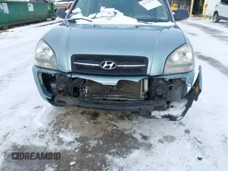 2006 Hyundai Tucson GL with VIN KM8JM72B06U298904, listed as a IAAI auction lot 41370728 with 209,284 mi miles. Bid and sale history available at carsss.com. Image 6.