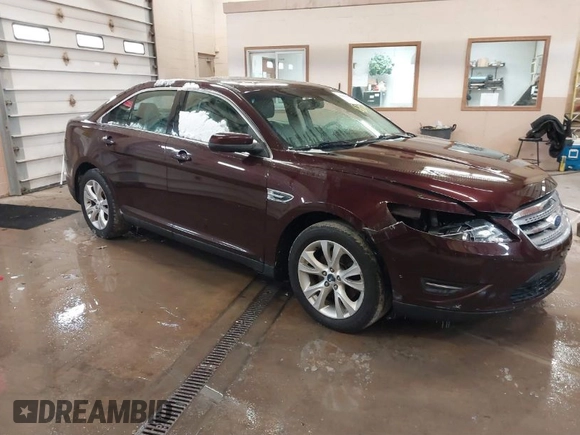 2011 Ford Taurus SEL z VIN 1FAHP2HW5BG141570, wystawiony jako IAAI lot #41867097 z przebiegiem 172 984 mil mil oraz . Historia ofert i sprzedaży dostępna na DreamBid. Obrazek 1.