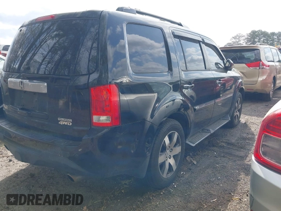 2012 Honda Pilot Touring with VIN 5FNYF4H92CB051260, listed as a IAAI auction lot 41906802 with 256,691 mi miles. Bid and sale history available at carsss.com. Image 4.