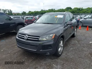 2012 Volkswagen Touareg Sport with VIN WVGFK9BP0CD002939, listed as a IAAI auction lot 42531654 with 222,435 mi miles and . Bid and sale history available at DreamBid. Image 6.