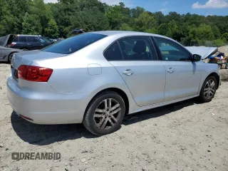 2014 Volkswagen Jetta S with VIN 3VW2K7AJ3EM227817, listed as a Copart auction lot 61415465 with 121,248 mi miles and Salvage title. Bid and sale history available at DreamBid. Image 3.