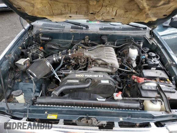 1998 Toyota Tacoma with VIN 4TAWN72N2WZ010087, listed as a Copart auction lot 47650315 with 317,285 mi miles and Salvage Title. Bid and sale history available at DreamBid. Image 13.