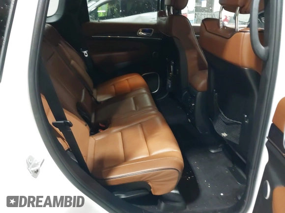 2018 Jeep Grand Cherokee Summit with VIN 1C4RJFJG7JC241007, listed as a IAAI auction lot 42336629 with 83,905 mi miles and . Bid and sale history available at DreamBid. Image 8.
