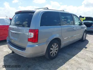 2014 Chrysler Town & Country Touring with VIN 2C4RC1BG6ER463885, listed as a IAAI auction lot 41943602 with 154,815 mi miles. Bid and sale history available at carsss.com. Image 4.