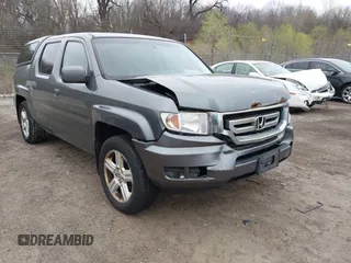 2011 Honda Ridgeline RTL with VIN 5FPYK1F54BB003338, listed as a IAAI auction lot 42059535 with 261,693 mi miles and . Bid and sale history available at DreamBid. Image 1.