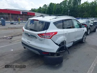 2016 Ford Escape Titanium with VIN 1FMCU9J90GUC48346, listed as a IAAI auction lot 42523307 with 114,265 mi miles and . Bid and sale history available at DreamBid. Image 4.
