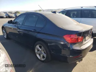 2013 BMW 3 Series 328i with VIN WBA3A5C52DF353760, listed as a Copart auction lot 62737045 with 129,354 mi miles and Salvage title. Bid and sale history available at DreamBid. Image 2.
