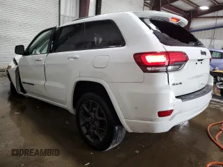 2021 Jeep Grand Cherokee 80th Anniversary z VIN 1C4RJFBG0MC525811, wystawiony jako Copart lot #55459965 z przebiegiem Nie podano mil oraz Szkoda całkowita • Salvage title. Historia ofert i sprzedaży dostępna na DreamBid. Obrazek 2.