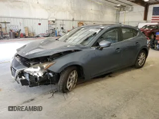 2015 Mazda 3 i Grand Touring with VIN JM1BM1M74F1238690, listed as a Copart auction lot 62676995 with 105,853 mi miles and Non repairable. Bid and sale history available at DreamBid. Image 1.