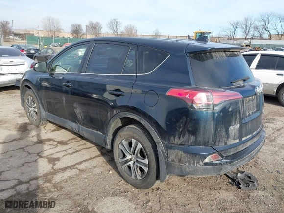 2018 Toyota RAV4 LE with VIN JTMBFREV5JD253342, listed as a IAAI auction lot 41656581 with 243,791 mi miles. Bid and sale history available at carsss.com. Image 3.