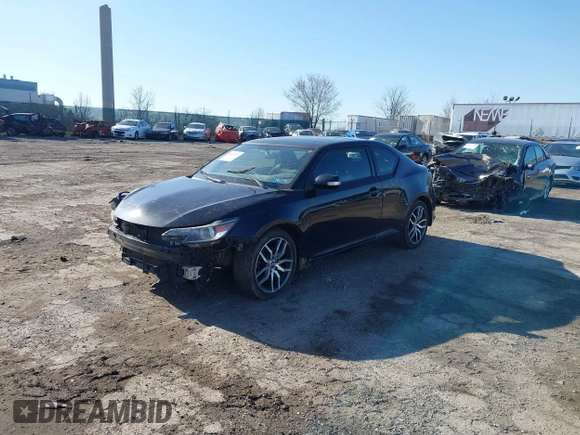 2014 Scion tC with VIN JTKJF5C78E3074094, listed as a IAAI auction lot 41828785 with 164,976 mi miles. Bid and sale history available at carsss.com. Image 2.