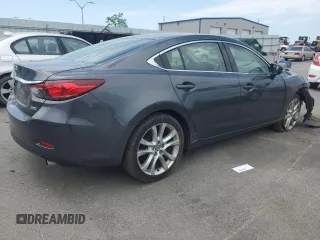 2014 Mazda Mazda6 i Touring with VIN JM1GJ1T51E1106029, listed as a Copart auction lot 57325764 with 169,788 mi miles and Clean Title. Bid and sale history available at carsss.com. Image 3.