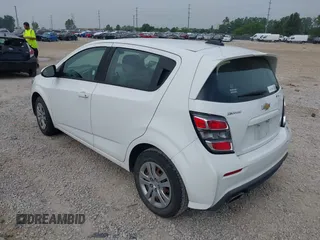 2018 Chevrolet Sonic LT with VIN 1G1JG6SH9J4107802, listed as a IAAI auction lot 42477241 with 107,091 mi miles and . Bid and sale history available at DreamBid. Image 3.