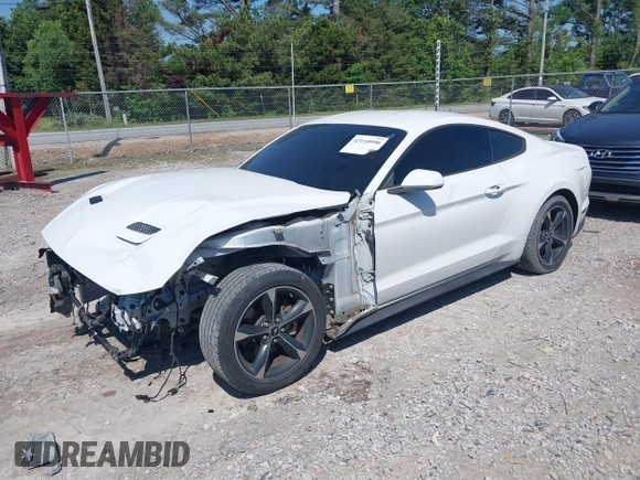 2018 Ford Mustang EcoBoost z VIN 1FA6P8TH2J5112959, wystawiony jako IAAI lot #42110990 z przebiegiem 97 088 mil mil oraz . Historia ofert i sprzedaży dostępna na DreamBid. Obrazek 17.