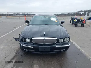 2004 Jaguar XJ with VIN SAJWA71C14SG20122, listed as a IAAI auction lot 41685767 with 113,392 mi miles. Bid and sale history available at carsss.com. Image 13.