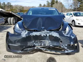 2021 Tesla Model Y Long Range z VIN 5YJYGDEE5MF065024, wystawiony jako Copart lot #48581215 z przebiegiem 82 794 mil mil oraz Szkody całkowita. Historia ofert i sprzedaży dostępna na DreamBid. Obrazek 5.