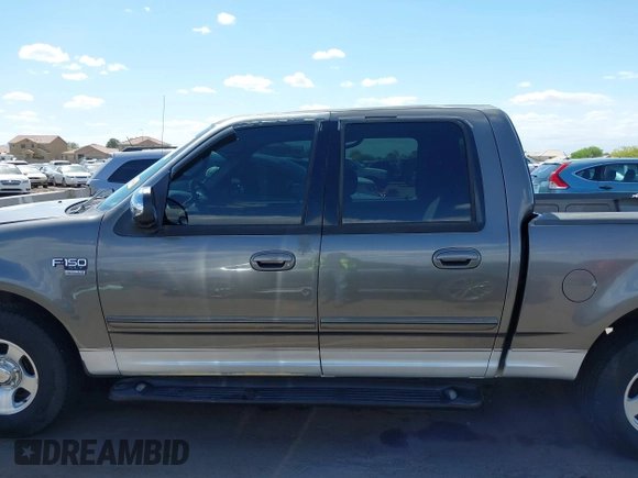 2002 Ford F-150 XLT with VIN 1FTRW07L22KB41794, listed as a IAAI auction lot 42072478 with 116,252 mi miles and . Bid and sale history available at DreamBid. Image 14.