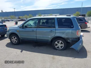 2007 Honda Pilot EX with VIN 2HKYF18447H520522, listed as a IAAI auction lot 42018937 with 128,401 mi miles. Bid and sale history available at carsss.com. Image 14.