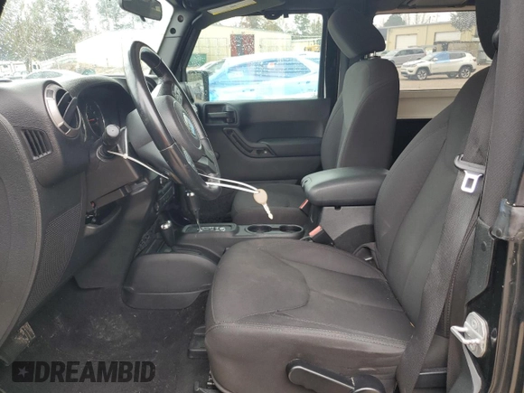 2015 Jeep Wrangler Sport with VIN 1C4AJWAG7FL576076, listed as a Copart auction lot 84072324 with 100,119 mi miles and Salvage Title. Bid and sale history available at carsss.com. Image 7.