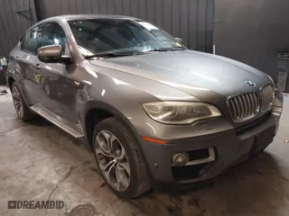 2014 BMW X6 50i with VIN 5UXFG8C55EL592995, listed as a IAAI auction lot 41724960 with 137,112 mi miles. Bid and sale history available at carsss.com. Image 1.