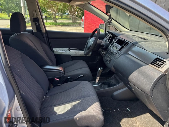 2009 Nissan Versa S with VIN 3N1BC13E99L412868, listed as a Copart auction lot 55990665 with 214,080 mi miles and Clean Title. Bid and sale history available at DreamBid. Image 5.
