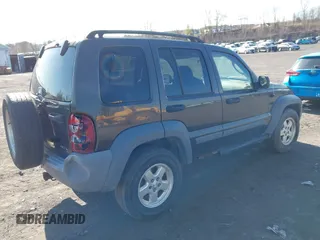 2005 Jeep Liberty Sport with VIN 1J4GL48K85W700799, listed as a IAAI auction lot 42054433 with 166,989 mi miles. Bid and sale history available at carsss.com. Image 4.