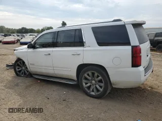 2015 Chevrolet Tahoe LTZ with VIN 1GNSKCKC1FR310018, listed as a Copart auction lot 71798454 with 244,179 mi miles and Salvage title. Bid and sale history available at DreamBid. Image 2.