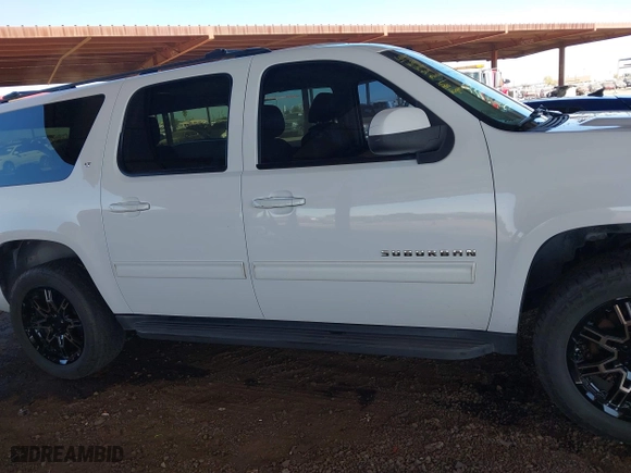 2012 Chevrolet Suburban LT with VIN 1GNSCJE05CR318556, listed as a IAAI auction lot 41654002 with 222,329 mi miles. Bid and sale history available at carsss.com. Image 14.