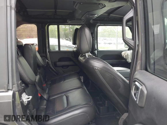 2021 Jeep Wrangler Unlimited Sahara with VIN 1C4JJXP60MW704738, listed as a IAAI auction lot 42042079 with 63,765 mi miles and . Bid and sale history available at DreamBid. Image 8.