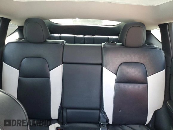2022 Tesla Model Y Long Range with VIN 7SAYGAEE2NF390507, listed as a Copart auction lot 50986965 with 48,027 mi miles and Non Repairable. Bid and sale history available at DreamBid. Image 10.