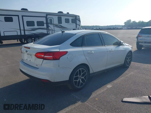 2018 Ford Focus SE с VIN 1FADP3F2XJL276733, выставлен на аукционе IAAI как лот 42537089 с пробегом Не указан миль и . История ставок и продаж доступна на DreamBid. Изображение 4.