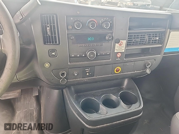 2013 Chevrolet Express Cargo with VIN 1GCWGFCA4D1142736, listed as a IAAI auction lot 42854305 with 128,585 mi miles and . Bid and sale history available at DreamBid. Image 3.