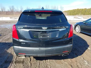 2019 Cadillac XT5 Premium Luxury AWD z VIN 1GYKNFRS1KZ250468, wystawiony jako IAAI lot #41764152 z przebiegiem 107 918 mil mil oraz . Historia ofert i sprzedaży dostępna na DreamBid. Obrazek 16.