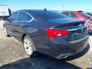 2014 Chevrolet Impala LTZ with VIN 2G1155S3XE9239989, listed as a IAAI auction lot 41749415 with 158,248 mi miles. Bid and sale history available at carsss.com. Image 3.
