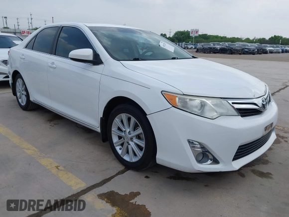 2014 Toyota Camry SE with VIN 4T1BK1FK5EU551196, listed as a IAAI auction lot 41912297 with 104,445 mi miles. Bid and sale history available at carsss.com. Image 1.