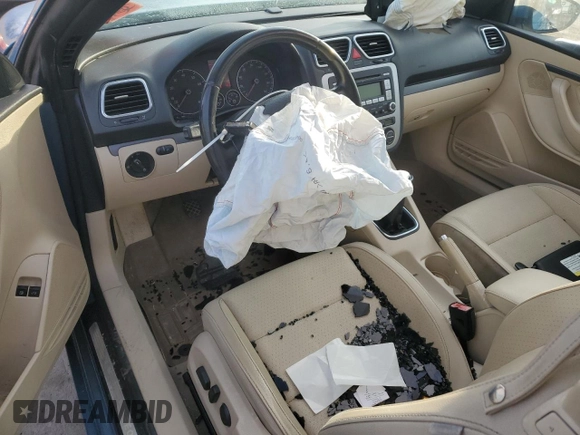 2009 Volkswagen Eos Komfort с VIN WVWAA71F79V016077, выставлен на аукционе Copart как лот 88357585 с пробегом 198 922 миль миль и Списание • Salvage title. История ставок и продаж доступна на DreamBid. Изображение 8.