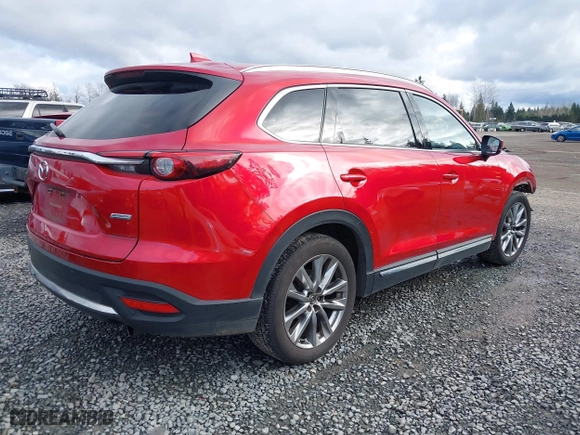 2016 Mazda CX-9 Grand Touring with VIN JM3TCBDY3G0113300, listed as a IAAI auction lot 41679987 with 69,024 mi miles. Bid and sale history available at carsss.com. Image 4.