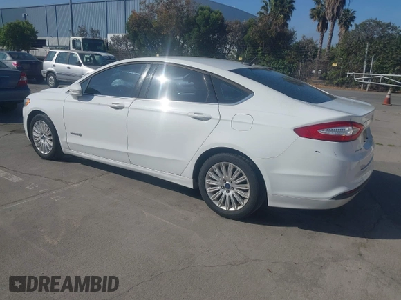 2014 Ford Fusion SE Hybrid with VIN 3FA6P0LU5ER256992, listed as a IAAI auction lot 42229147 with 235,583 mi miles and . Bid and sale history available at DreamBid. Image 3.