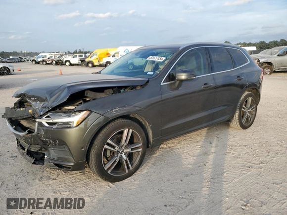2018 Volvo XC60 Momentum with VIN LYV102RK0JB106389, listed as a Copart auction lot 82677454 with 114,832 mi miles and Salvage Title. Bid and sale history available at carsss.com. Image 1.