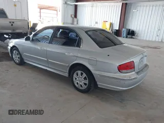 2002 Hyundai Sonata GLS with VIN KMHWF35H32A643718, listed as a IAAI auction lot 41668672 with 174,782 mi miles. Bid and sale history available at carsss.com. Image 3.